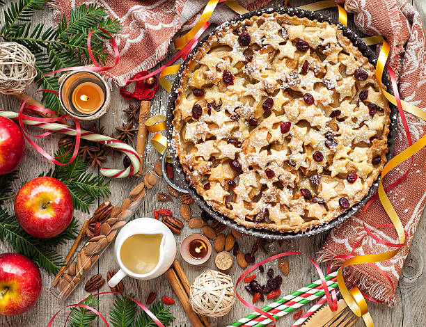 Christmas appleon a rustic tabletop. stock photo