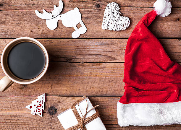istock Cup of coffee and Santas hat, Christmas set 617874356