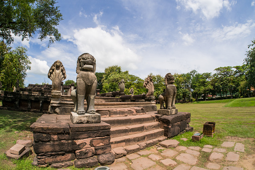Lion and Naga sandstone statue in Phimai historical park.Prasat Hin Phimai Nakhonratchasima Thailand.