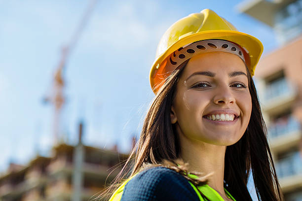 istock Close up of a female engineer at construction site 617877136