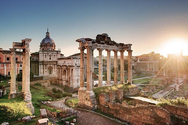 istock Roman Forum at sunrise, Italy 617877600