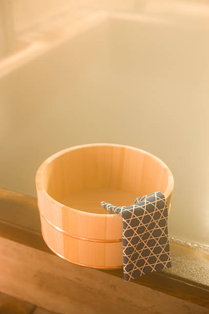 istock Water tub with Japanese towel in hot spring 617878064