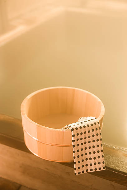 istock Water tub with Japanese towel in hot spring 617878114