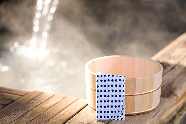 Water tub with Japanese towel in hot spring