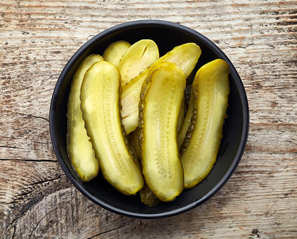 istock Bowl of pickled cucumber, from above 617879128