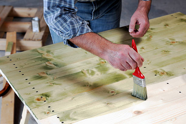 istock Carpenter at work on the wood. 617881524