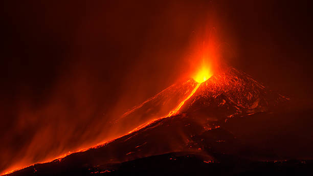 Eruption of Etna Eruption of the mount Etna happened on the 3rd December 2015. The phenomenon was photographed from mount Serracozzo.  active volcano photos stock pictures, royalty-free photos & images