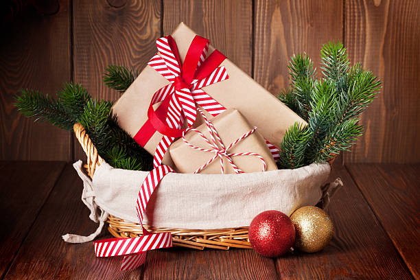 istock Christmas gifts and tree branch 617883526