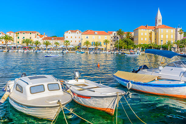 Supetar Brac scenic view. View at coastal town SUpetar, popular touristic destination in Croatia, Island Brac. old catholic church on island brac croatia stock pictures, royalty-free photos & images