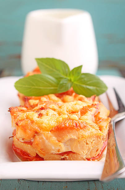 istock chicken baked with tomatoes and cheese 617887694