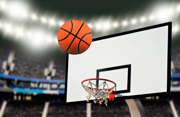 istock shooting a basketball goal 617890258