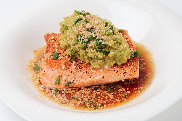 istock Grilled salmon fillet with avocado mash 617890536