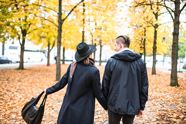 istock romantic couple in autumn in Berlin 617892166