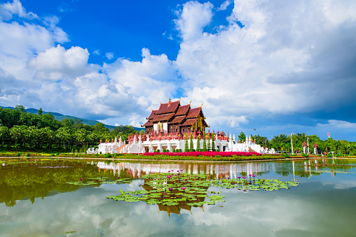 Royal Pavilion (Ho Kham Luang) in Royal Park Rajapruek with frontground lotus in Chiang Mai, Thailand