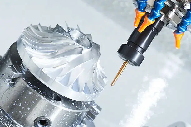 industrial metalworking machining cutting process by precision milling cutter with hardmetal carbide insert at modern cnc machine.