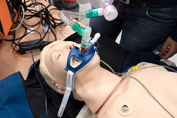 istock Medical training first aid dummy with Laryngeal tube 617894374