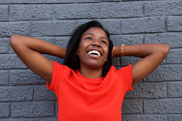 istock Happy girl holding arms behind head 617894798