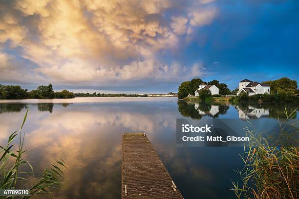 Beautiful Mammatus Clouds Forming Over Lake Landscape Stock Photo - Download Image Now