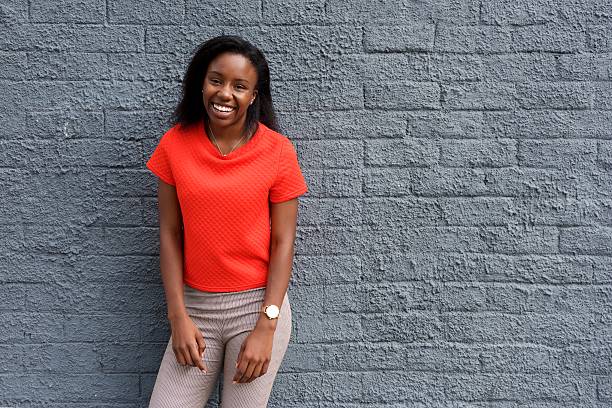 istock African beautiful woman laughing 617895538