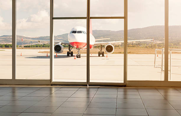istock Passenger Plane Waiting on Airport 617898546