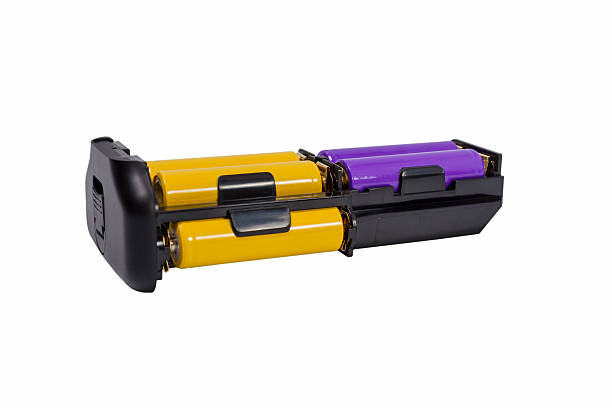 istock Adapter AA batteries for the battery handle modern DSLR camera 617899080