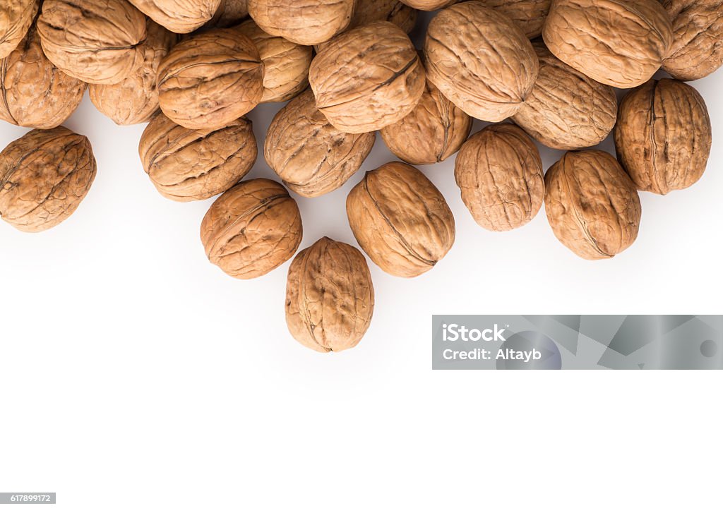 Walnuts Walnuts with copy space , isolated on white Walnut Stock Photo