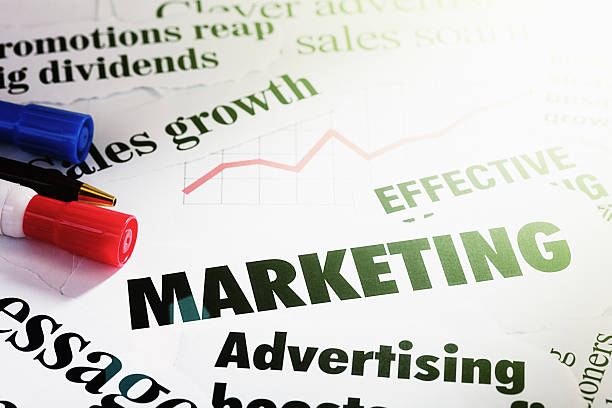 istock Headlines on marketing themes with pens and graph 617901580
