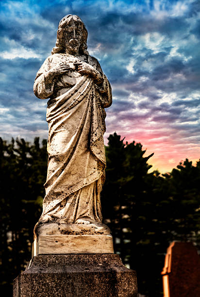 istock Jesus statue in cemetary 617902922