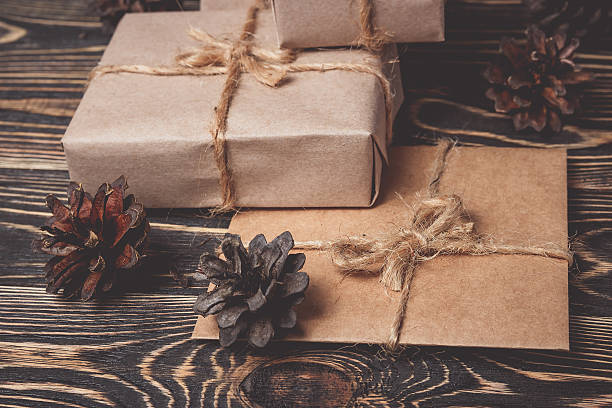 istock Christmas gifts box presents on brown 617903938