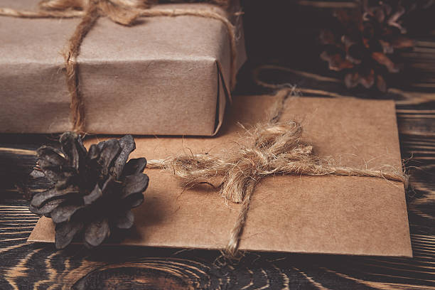 istock Christmas gifts box presents on brown 617904010