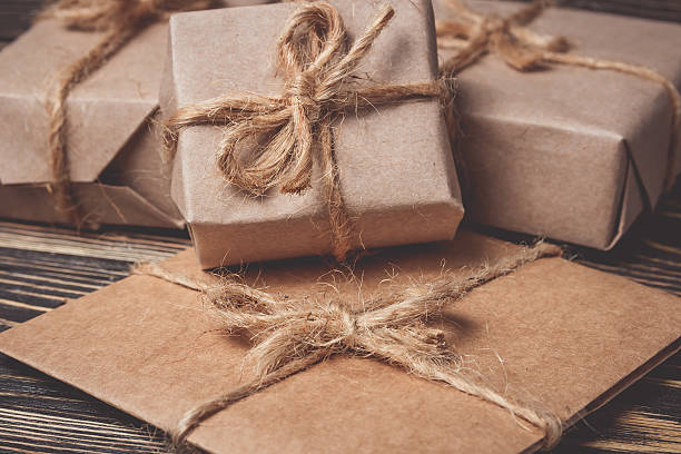 istock Christmas gifts box presents on brown 617904218