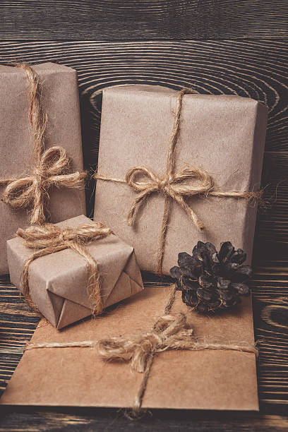 istock Christmas gifts box presents on brown 617904452