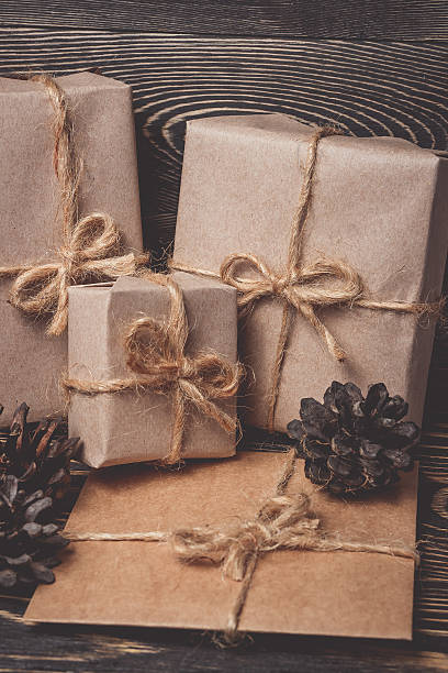 istock Christmas gifts box presents on brown 617904510