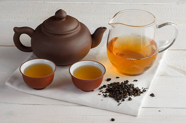 istock tea set on wooden background 617905208