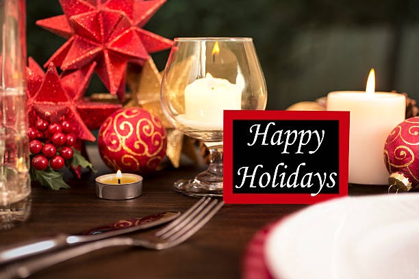 istock Dining table place setting with Christmas holiday decorations. 617907258