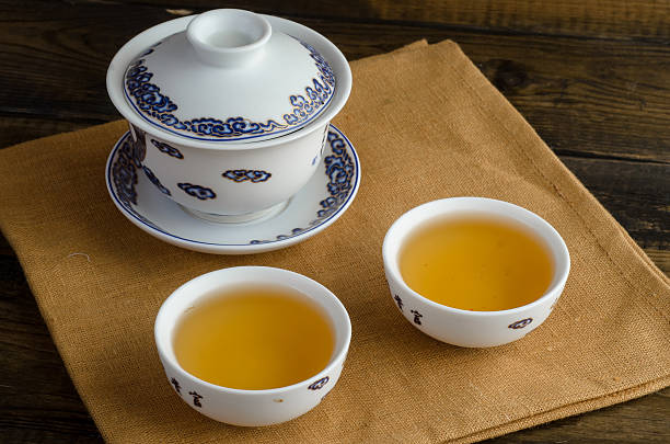 istock tea set on wooden background 617908186