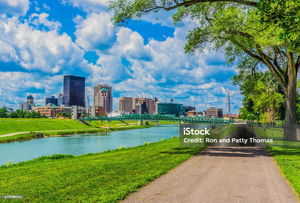 Downtown Dayton, Ohio and the Great Miami River (P) The Great Miami River runs through a river walk area in the River Scape of the Five Rivers Metroparks area of Dayton, Ohio, USA. Public Park Stock Photo
