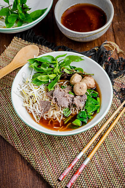 istock asian noodle soup with beef meatball with fresh vegetable 617908822