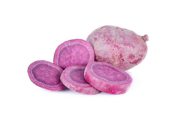 istock whole and sliced uncooked potato on white background 617910372