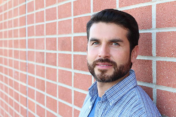 istock Hispanic Businessman Smiling Outside Office 618023628