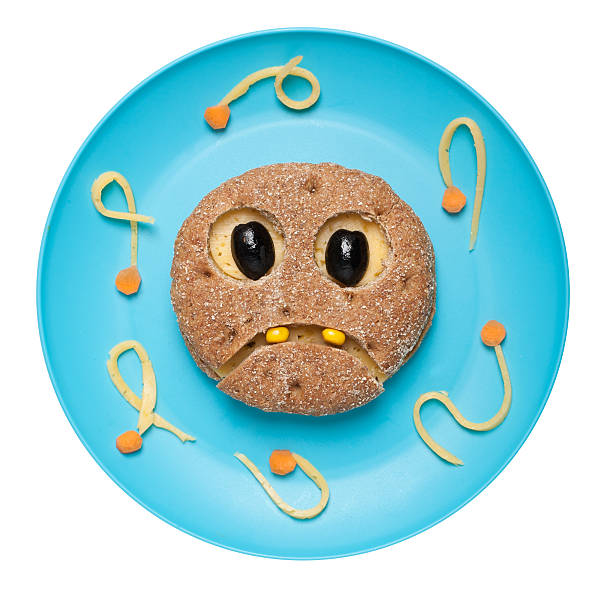 istock Ghost made of bread on blue plate 618028592