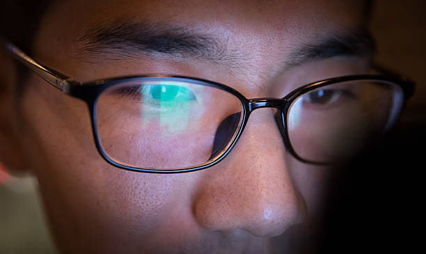 istock close-up man using his smart phone 618030386