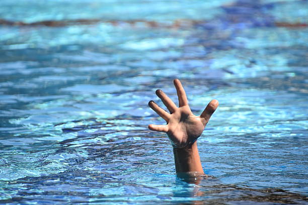 istock Hand of a man drowning 618034376