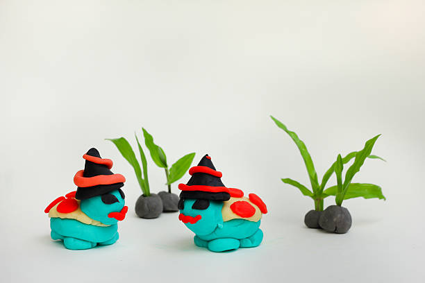 istock Dough molding a Halloween turtle on a white background. 618034814