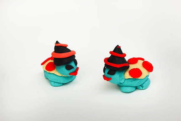 istock Dough molding a Halloween turtle on a white background. 618034856