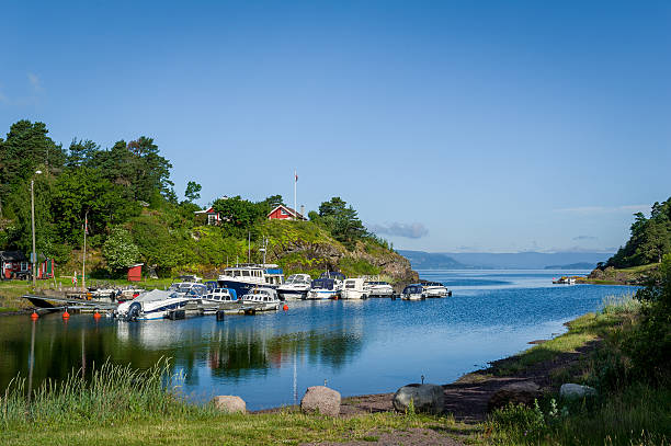 istock Typical nordic bay with recreational boats moored 618040772