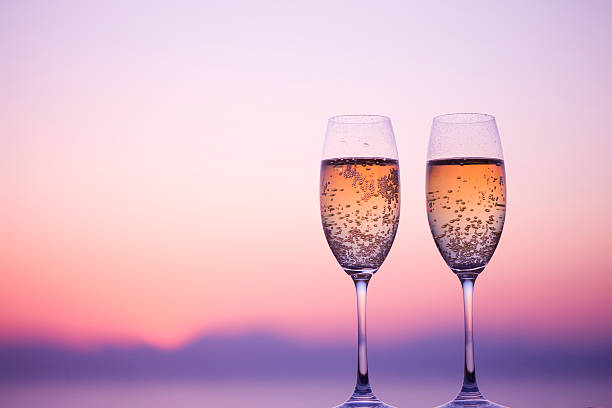 Two glasses of Champagne in twilight Two glasses of Champagne in twilight fujisawa kanagawa photos stock pictures, royalty-free photos & images