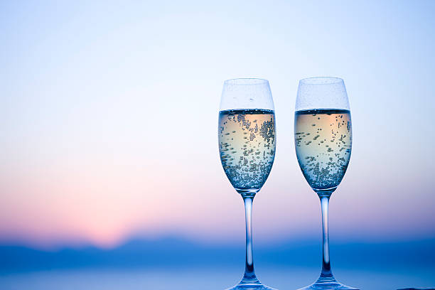 istock Two glasses of Champagne in twilight 618042158