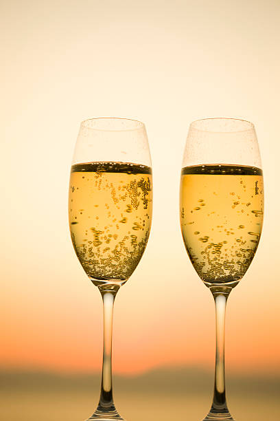 istock Two glasses of Champagne in twilight 618042184