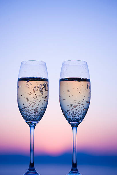 istock Two glasses of Champagne in twilight 618042212